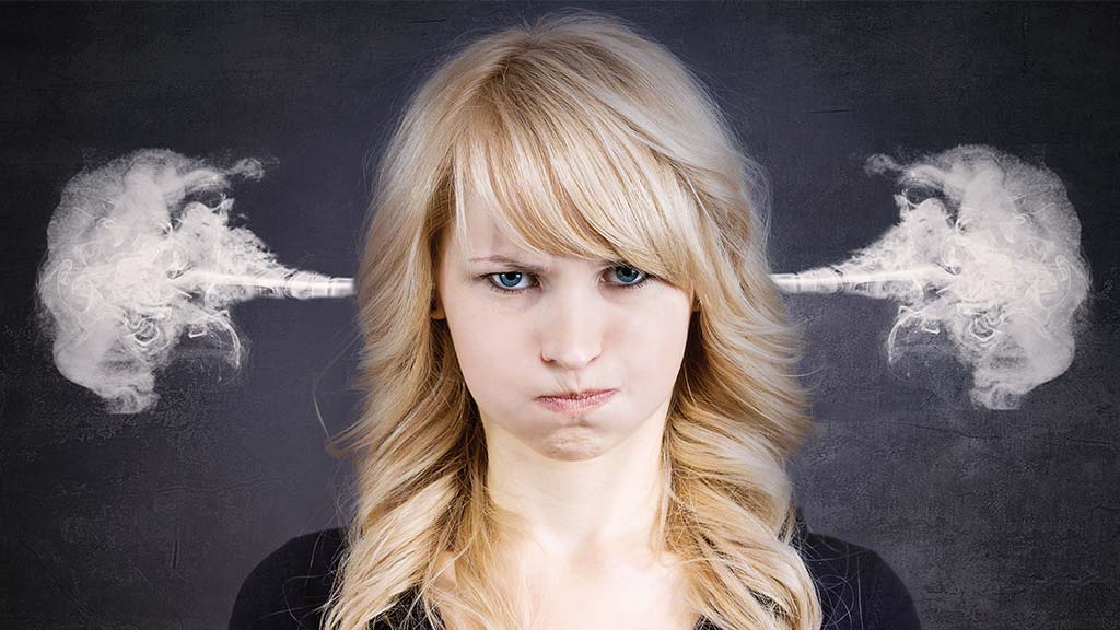 woman with steam coming out of her ears