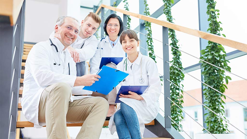 hospital doctors gathering for a review